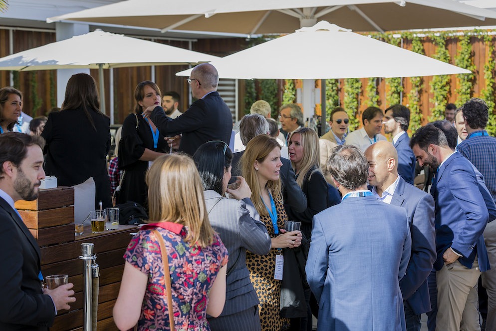Attendees and key stakeholders from the iGaming industry networking outdoors at the 2025 Gaming in Spain Conference in Madrid.
