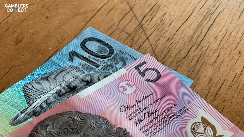 Close-up of Australian currency, symbolizing the financial penalties enforced by the Australian Communications and Media Authority (ACMA) for spam violations.