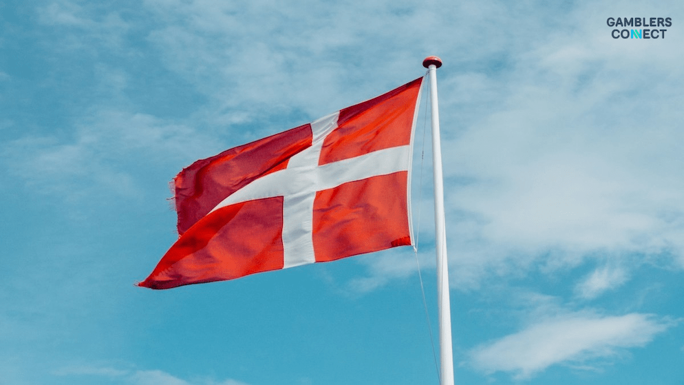 The Danish flag, representing the nation where the DGA has introduced firmer regulations on promotional incentives and advertising content for online gambling operators.
