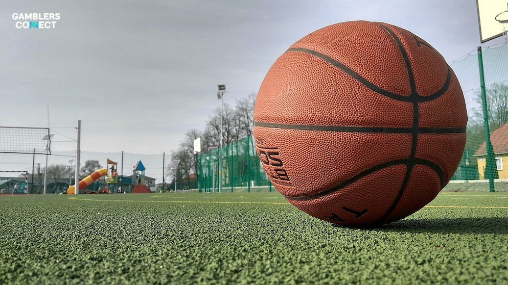 A basketball court scene, representing the allegations against former NBA star Gilbert Arenas related to illegal high-stakes poker games.