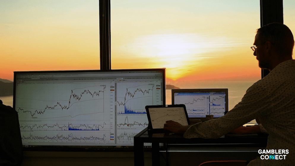 Multiple screens showing financial data, symbolizing the details of the Hann Holdings public offering, which aims to raise up to PHP 11.43 billion.