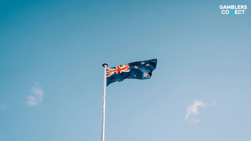 The New Zealand flag, symbolizing the nation's move towards a regulated iGaming market with the Green Party's support for a new casino bill.