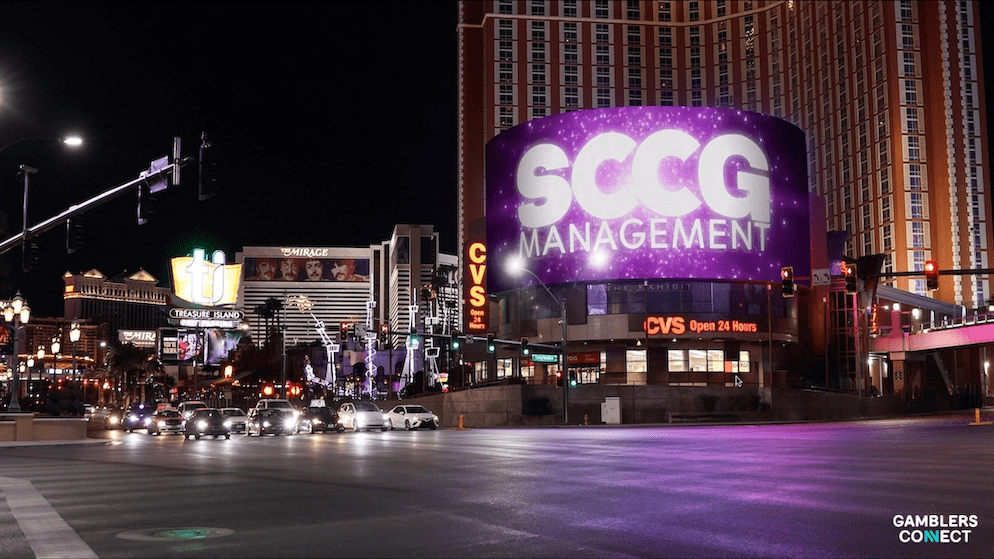 The SCCG Management brand illuminated at night, representing the advisory firm's leadership as it launches SCCG Brazil under new Country Manager Jose Augusto Paulista.