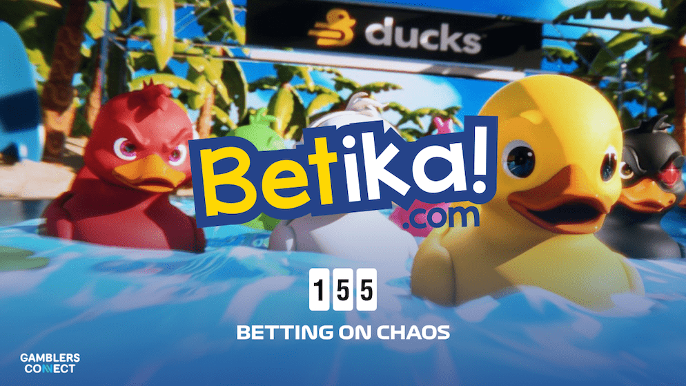 A view of the real-world studio for the game Ducks.io, showing branded rubber ducks floating on a custom-built lazy river, ready to race.