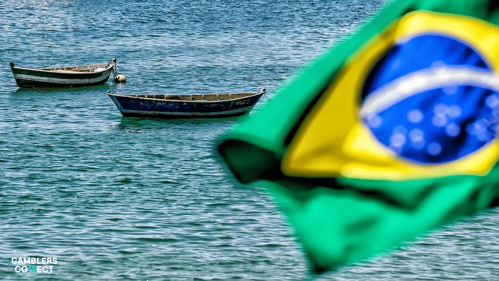The flag of Brazil symbolizes the country's iGaming landscape, currently being shaped by the contrast between illicit operations and legitimate investments from brands like Betano and platform providers like Lotus iGaming.