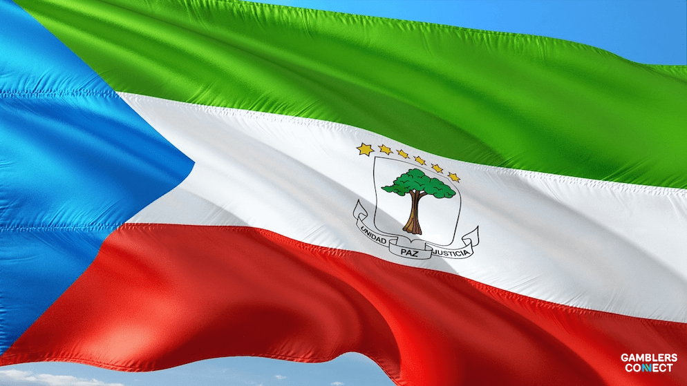 The flag of Equatorial Guinea symbolizing the nation's new legal framework for online betting, gaming, and casino operations.