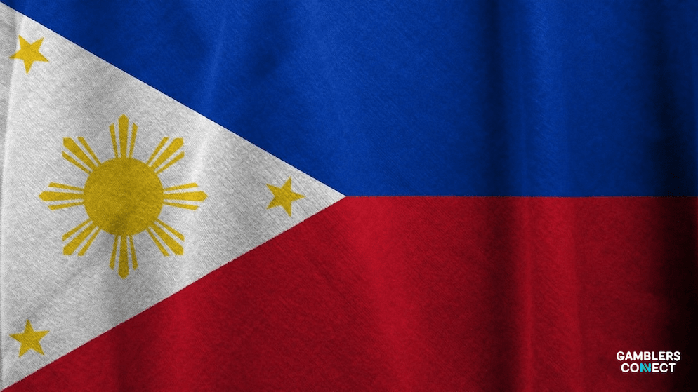 A consumer in the Philippines using a smartphone for a digital financial transaction, representing the user base the new BSP rules aim to protect.
