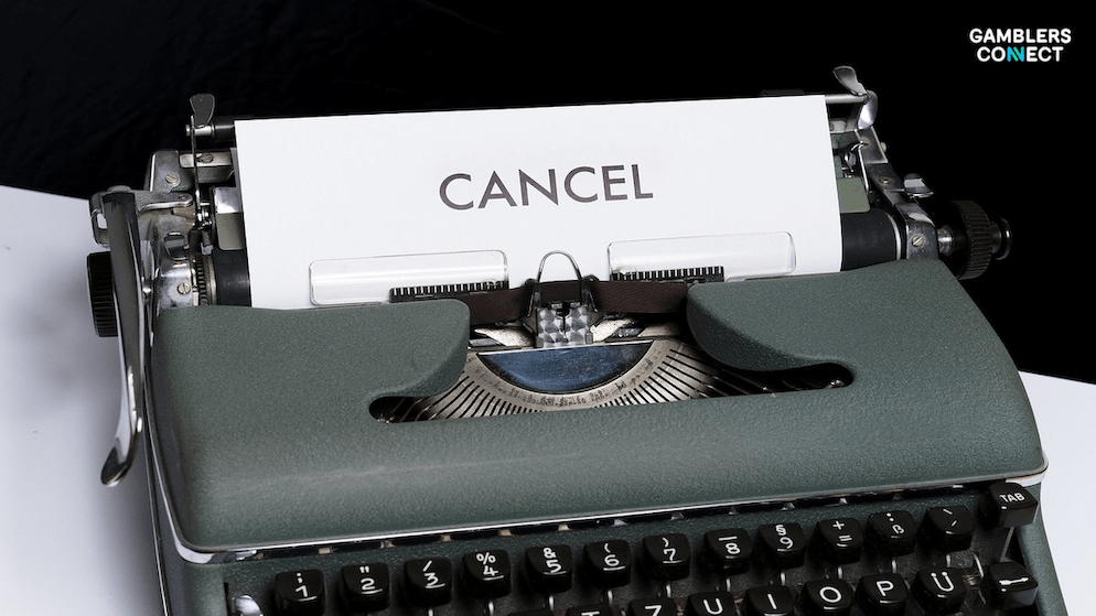 A typewriter showing the word "CANCEL," representing the end of Betr's hopes for a successful acquisition of PointsBet.