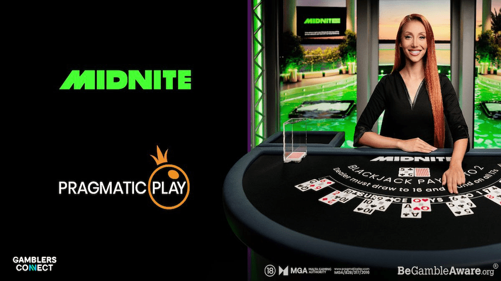 A close-up of the Midnite live Blackjack table, powered by Pragmatic Play's Smart Studio, showing the dealer and custom branding on the felt.