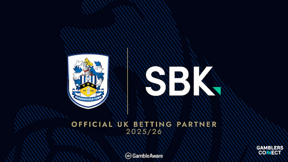 The official partnership graphic showing the logos of SBK and Huddersfield Town FC, celebrating their new sponsorship agreement for the 2025/26 season.