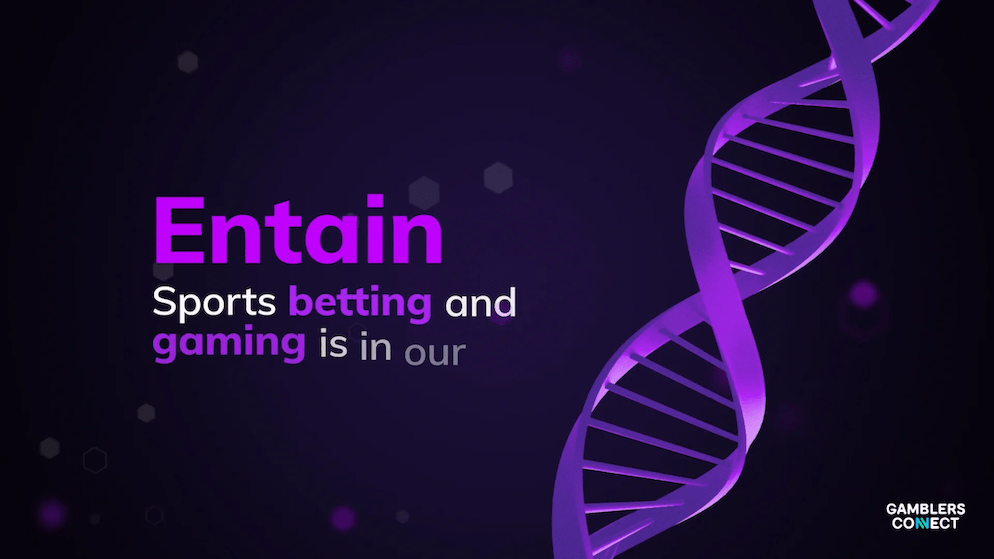 Entain's brand message, "Sports betting and gaming is in our DNA," accompanied by a stylized purple DNA strand on a dark background.