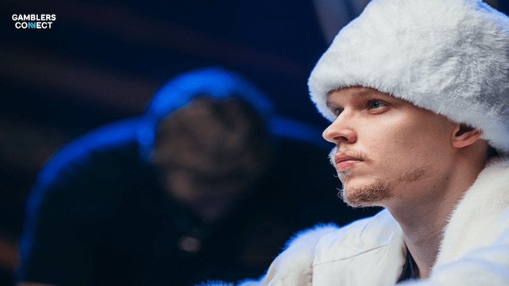 A profile shot of iGaming executive Ossi Ketola, known for his past as poker pro Monarch, looking thoughtfully during a professional poker event.