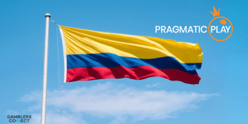 The Colombian flag waving under a blue sky, overlaid with the Pragmatic Play logo, symbolizing the launch of their new live casino studio in Bogotá.