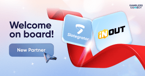 A digital graphic with "Welcome on board!" text, a "New Partner" button, and the logos of Slotegrator and InOut Games, symbolizing their new strategic collaboration.