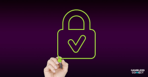 A hand drawing a bright green padlock icon with a prominent checkmark on a dark purple background, symbolizing BetBlocker's effective gambling blocking software and enhanced user protection.