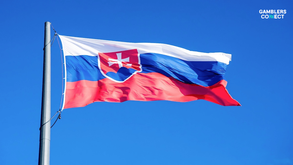 A flag flying high, representing the authority of the Slovakian Gambling Regulation Office as it orders sports bodies to cut ties with illegal operators.
