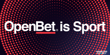 A sprawling metropolitan cityscape at dusk, symbolizing the global reach and market expansion of the new data partnership between OpenBet and TxODDS.