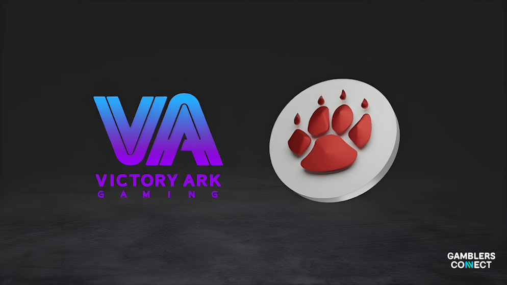 The official logos of game aggregator QTech Games and developer VA Gaming displayed side-by-side against map and circuit backgrounds, representing their collaboration for international distribution.