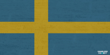 The national flag of Sweden, blue with a yellow cross, textured against a blue background, symbolizing the jurisdiction of the Swedish Gambling Authority (Spelinspektionen).