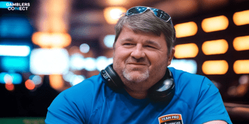 Close-up portrait of Chris Moneymaker smiling, wearing headphones around his neck, reflecting his role as a major poker personality and ambassador.