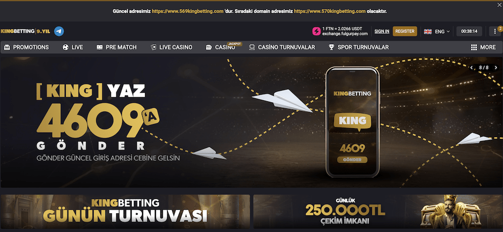 Image of a crowned, bearded king figure seated on a throne, smiling while interacting with a tablet displaying a live football betting market and slot machine games, symbolizing the hybrid platform.