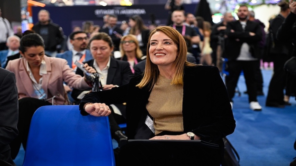 Roberta Metsola, President of the European Parliament, smiling and engaged while seated in the audience at SiGMA Central Europe in Rome.