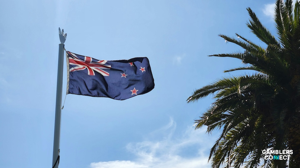 A view of the New Zealand flag representing the new online casino bill and consumer protection measures announced by Minister Brooke van Velden.