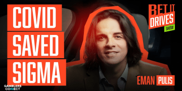 Eman Pulis sitting in a car for the season 3 premiere of the Bet It Drives show, with text reading "COVID SAVED SIGMA".