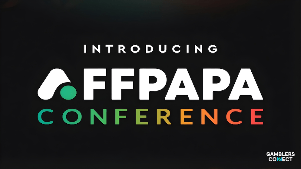 Professionals networking at a private iGaming Club event, holding C-level discussions in an upscale venue.