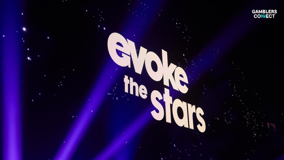 evoke MND Race Day fundraiser, featuring charity branding and volunteers.