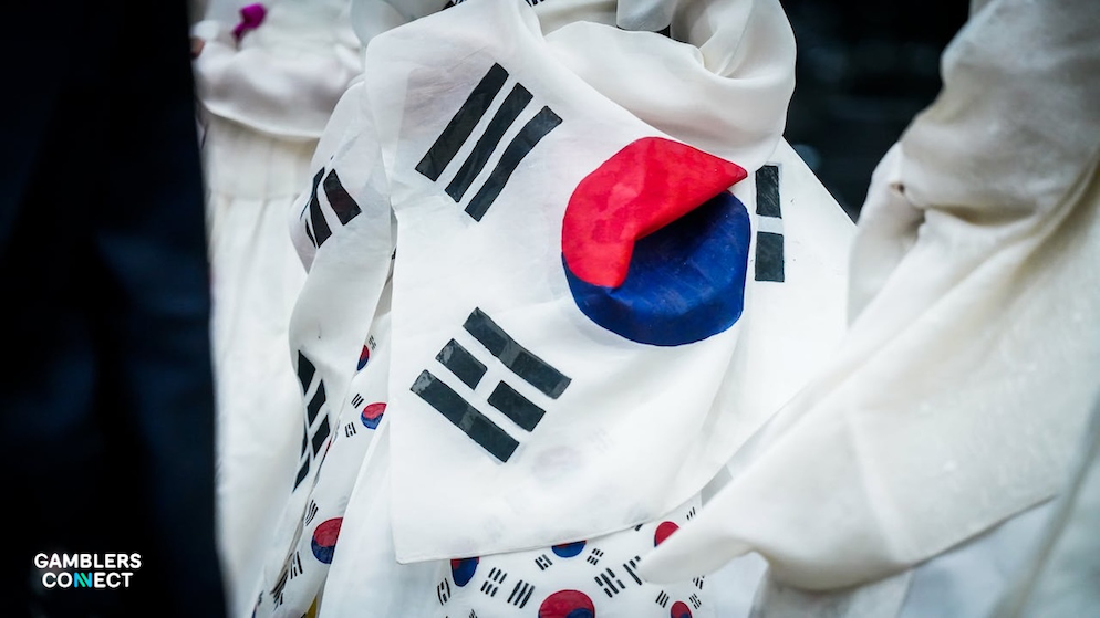 Close-up detail of the South Korean flag on traditional clothing, representing President Lee Jae-myung push for stricter public sector oversight in the gambling industry.