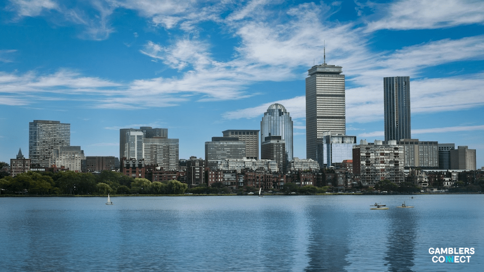 A view of the Charles River and Boston skyline, symbolizing the state's enforcement of regulated sports wagering laws against unlicensed prediction markets.