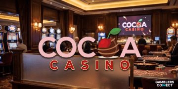 A view of a casino room with the logo of Cocoa Casino taking center stage