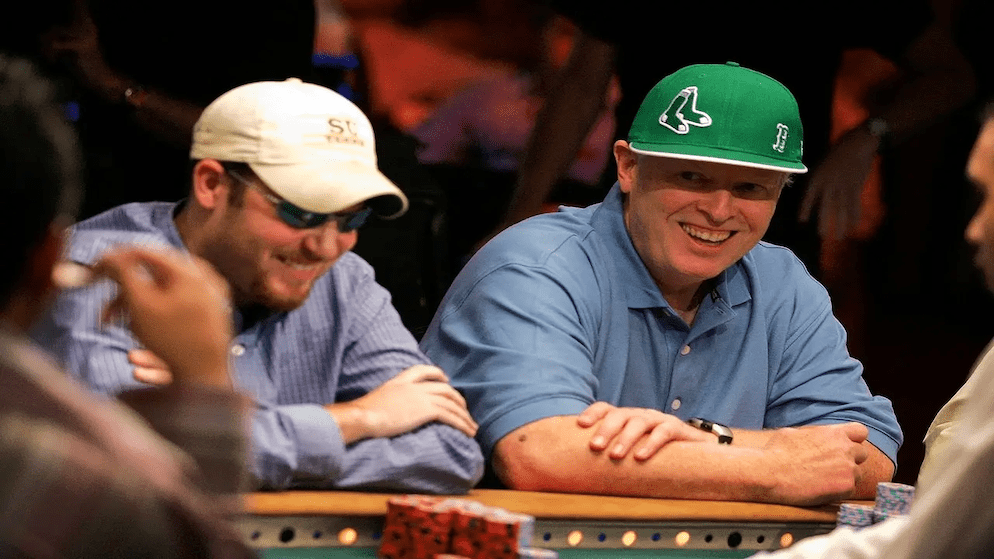 A staple of the "Golden Age" of poker, Dan Harrington's stoic presence at the table—marked by his green cap and crossed arms—was intimidating to amateurs and pros alike.