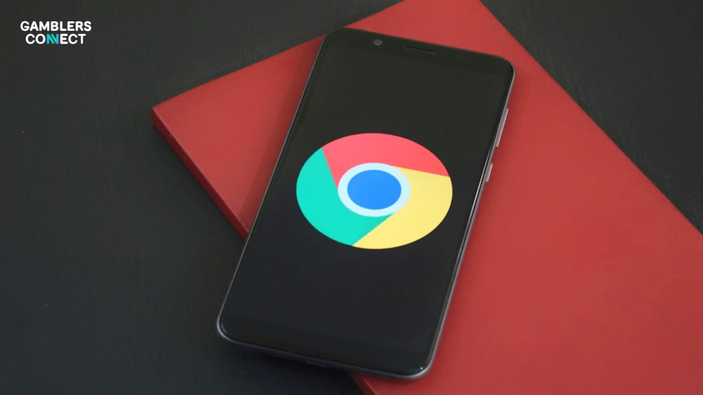 A mobile device showing the Chrome browser logo, symbolizing the digital gatekeeping Google is enforcing to weed out non-compliant gambling affiliates and illegal operators.