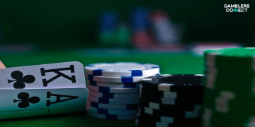 A close-up of a poker hand and chips, symbolizing Veldhuis's return to the felt as an independent player.