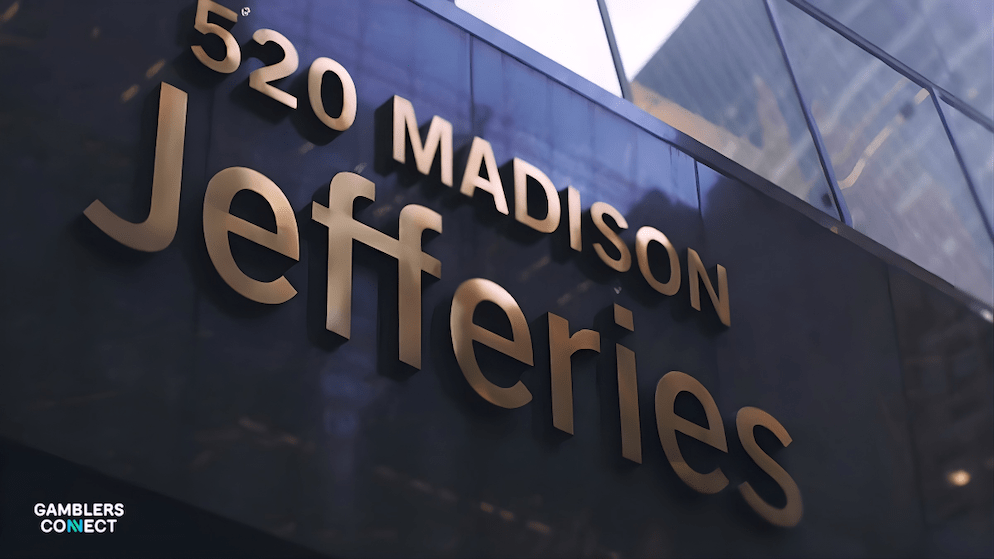 A close-up view of the Jefferies logo on a building facade, symbolizing the firm's optimistic "buy" ratings for major Macau operators like Galaxy and Sands.