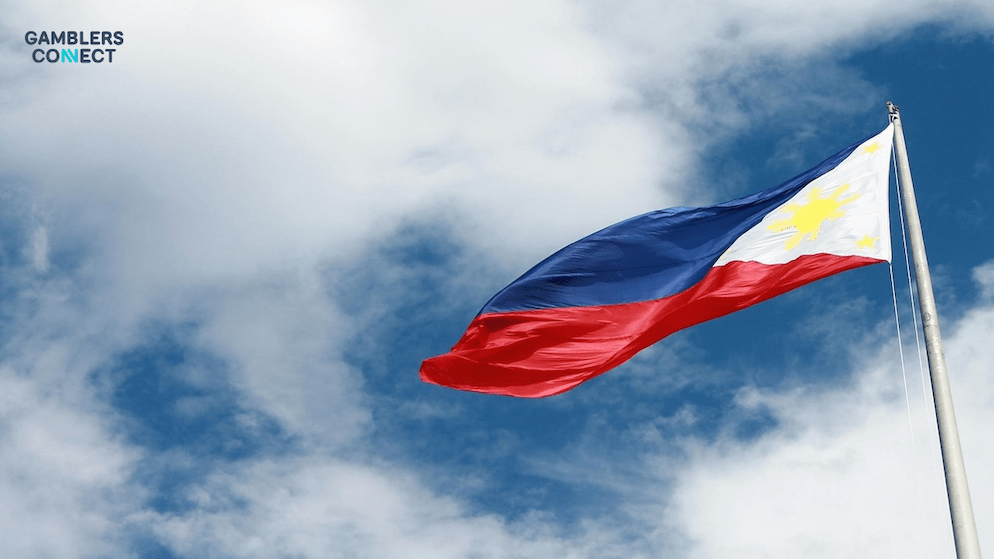 The flag of the Philippines flying on a flagpole, symbolizing the stricter oversight and higher revenue targets set for licensed operators.