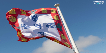 The flag of Portugal displayed next to a digital representation of a mobile sports betting interface, symbolizing the new legislative updates.