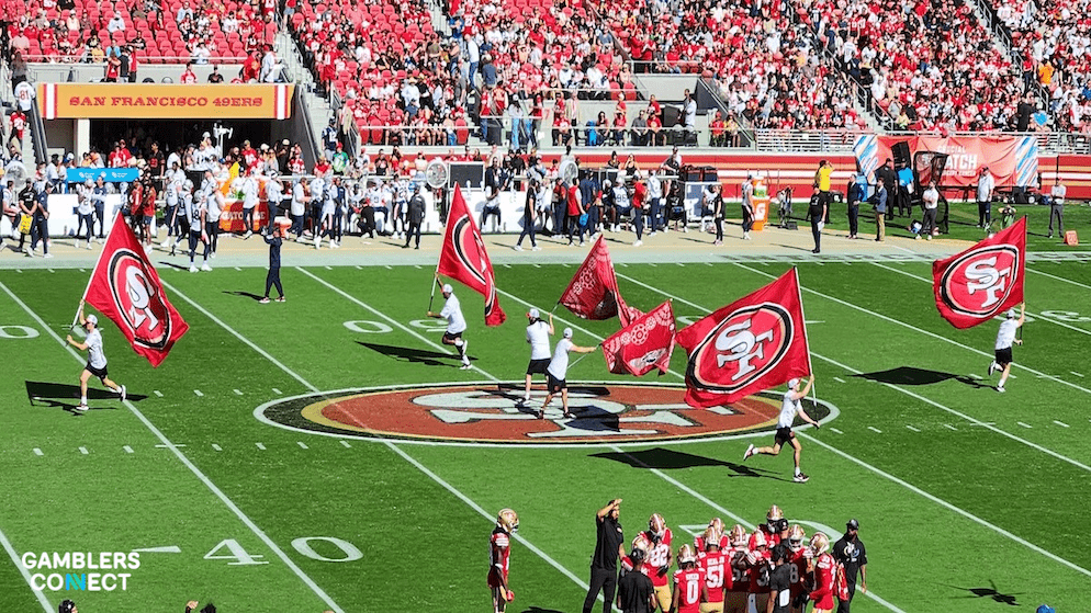 NFL Commissioner Roger Goodell speaking at a podium during a press conference regarding league policies and sports betting integrity.