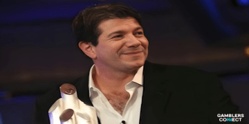 French professional poker player David Benyamine smiling at a high-stakes tournament event.