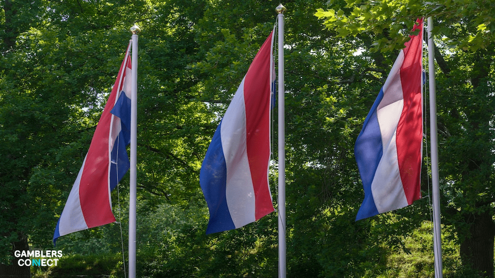 Close-up of the Dutch flag, highlighting the localized regulations that prohibit betting on youth sports within the Netherlands.