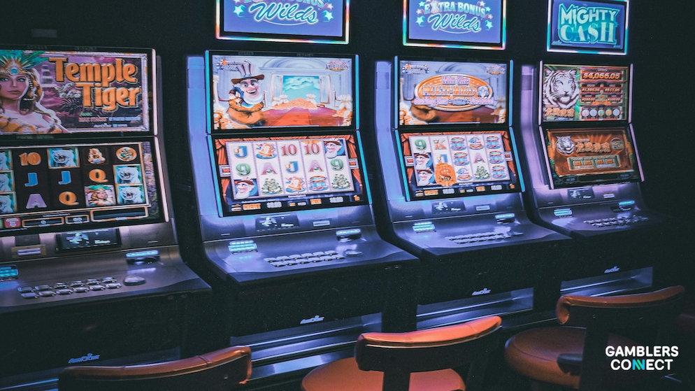 A smartphone displaying a popular online casino slot library featuring games like Zeus vs Hades and Fortune Tiger, illustrating mobile slot variety and navigation.