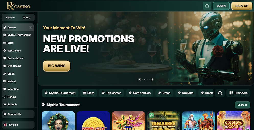 A wide view of the RX Casino homepage featuring the Royal Green theme, a robotic character in a tuxedo, and a "Your Moment To Win" welcome banner.
