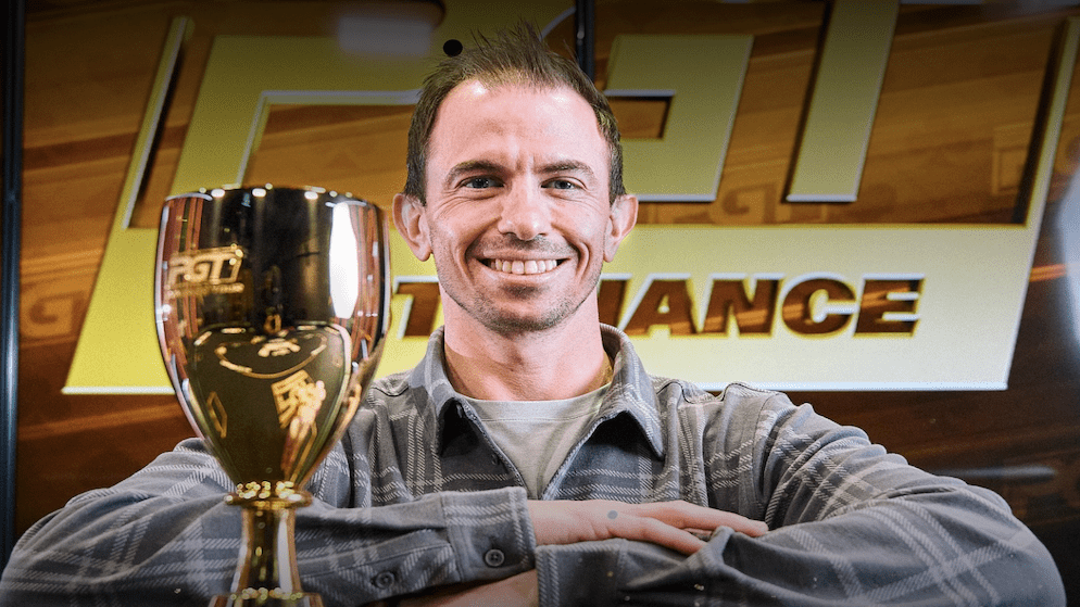 High-stakes pro Shannon Shorr in a red jersey, a staple of the global high roller poker circuit and three-time WSOP winner.