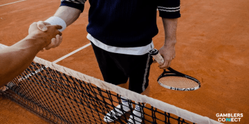 Handshake over a tennis net symbolizing sportsmanship and integrity