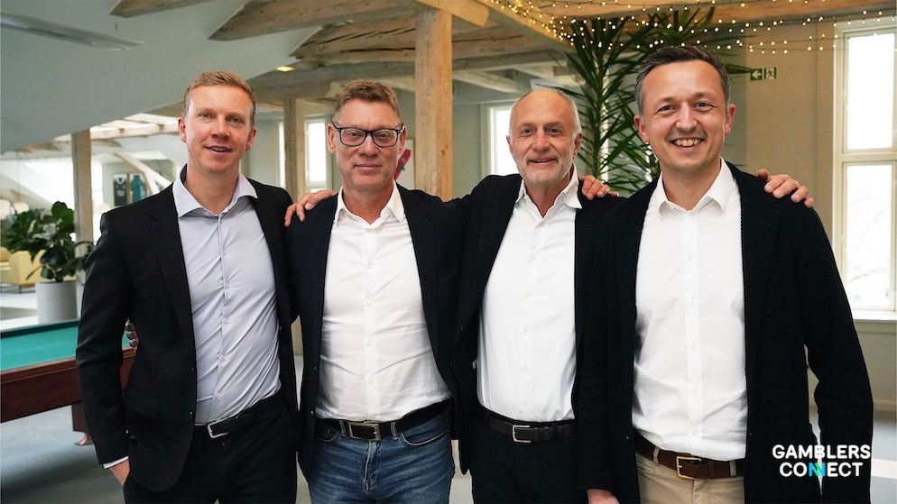 Thomas Plenborg (second from left) succeeds Jens Bager (third from left) as Chair of Better Collective.