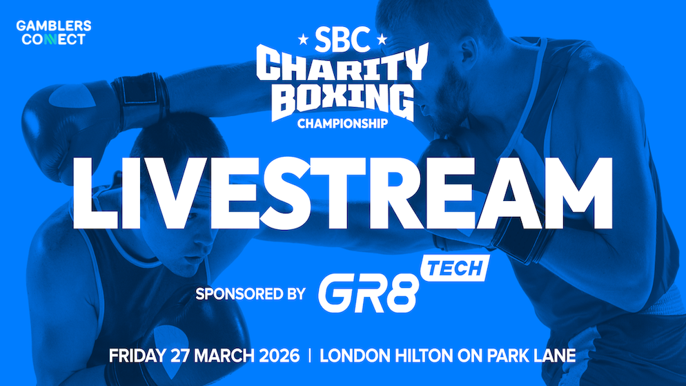 ction shot from a previous SBC Charity Boxing event showing a fighter in the ring with the PartyPoker Tour logo visible in the background.