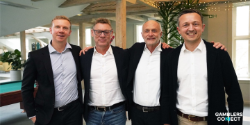 From left to right: Christian Kirk Rasmussen, Thomas Plenborg, Jens Bager, and Jesper Søgaard standing together at the Better Collective 2026 AGM.