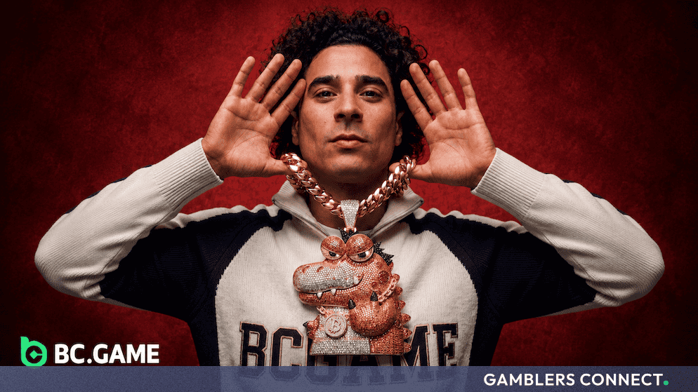 Mexican goalkeeper Guillermo Ochoa presenting a custom BC.GAME branded luxury pendant, representing new fan engagement initiatives across North America.